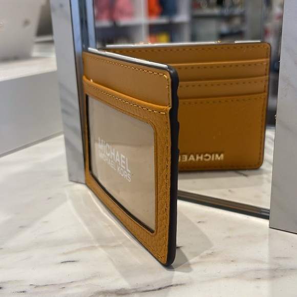 MICHAEL KORS
Large Pebbled Leather Card Holder Case
Cider
NWT - Picture 8 of 16